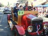 Dominick, 14, and Tilio, 11, ride with their firefighter dad, John Coni, in a 1923 Chemical Wagon, July 4, 2019, Sonoma.