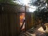 A fire burns dangerously close to a Rohnert Park apartment complex, July 17, 2019.