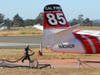 Cal Fire 85 returns Saturday, Aug. 3, 2019 from the Marsh Complex Fire to reload fire retardant at the Cal Fire Air Attack base at Sonoma County Airport.