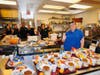 CHP officers are pictured at Epiphany Church in Vacaville, California, Tuesday, Aug. 13, 2019, where they prepared and served lunch to homeless and disadvantaged Solano County residents.