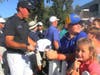 Golf pro Phil Mickelson takes time to sign 5-year-old Hayley Due's hat during the Safeway Open Pro-Am, Sept. 25, 2019.