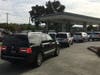 People potentially affected by a fire-weather related PG&E power shutoff in Northern California line up at a Sonoma County gas station to fill their gas tanks and even some containers, Oct. 8, 2019.