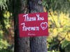 A sign thanks firefighters for saving their home.