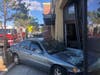 A Honda Accord landed halfway inside a Starbucks store in Petaluma, California, Friday, Nov. 15, 2019, injuring three people, authorities said.