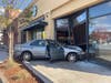 A Honda Accord landed halfway inside a Starbucks store in Petaluma, California, Friday, Nov. 15, 2019, injuring three people, authorities said.