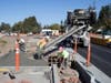 Crews perform final work prior to opening the new roundabout that accommodates traffic at the SR-29 freeway on- and off-ramps at First Street in Napa, California.