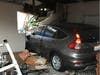 A Honda SUV is shown after it crashed into the garage of a Petaluma home Wednesday, Dec. 4, 2019.