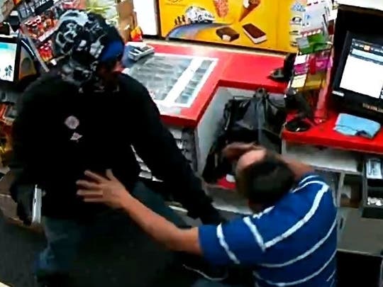 Surveillance images show the confrontation between East Bay convenience store clerks and two robbers.