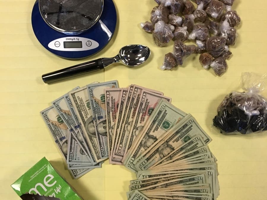 Police recovered the above cash, heroin and paraphernalia during a search Thursday of a residence in the 3900 block of Montgomery Drive in Santa Rosa, California.