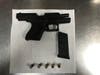 Police say this black Glock 43 .9mm-caliber handgun was recovered from an attempted homicide suspect's car.