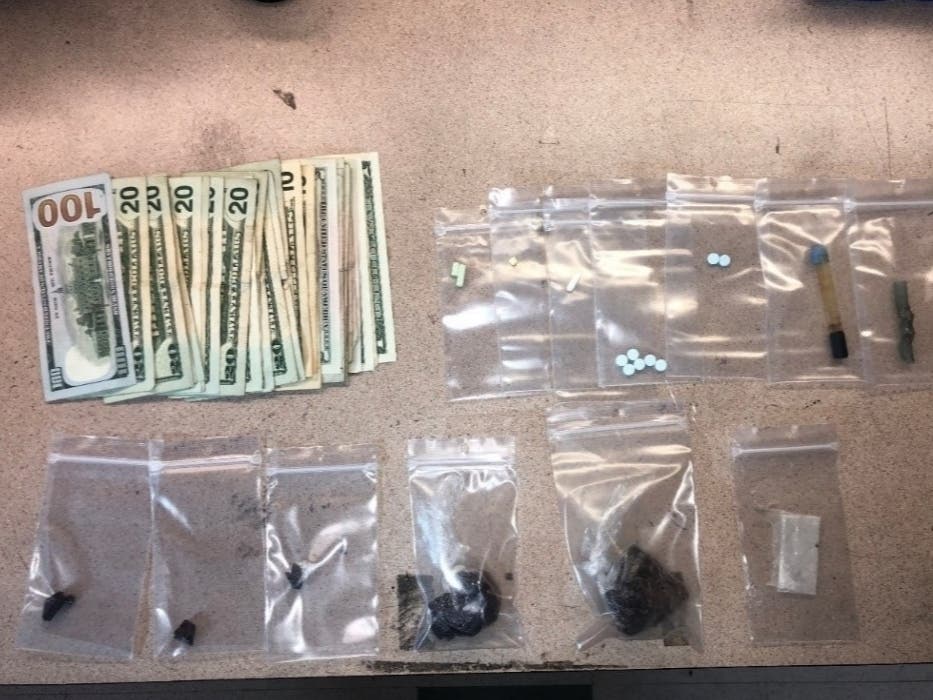 Heroin, fentanyl pills, heroin pipes and cash — all pictured — were seized Wednesday night by Rohnert Park Department of Public Safety.