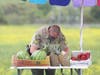 A Sonoma County sheriff's deputy cites a fruit stand worker for not adhering to the county's coronavirus-related public health order for essential businesses.