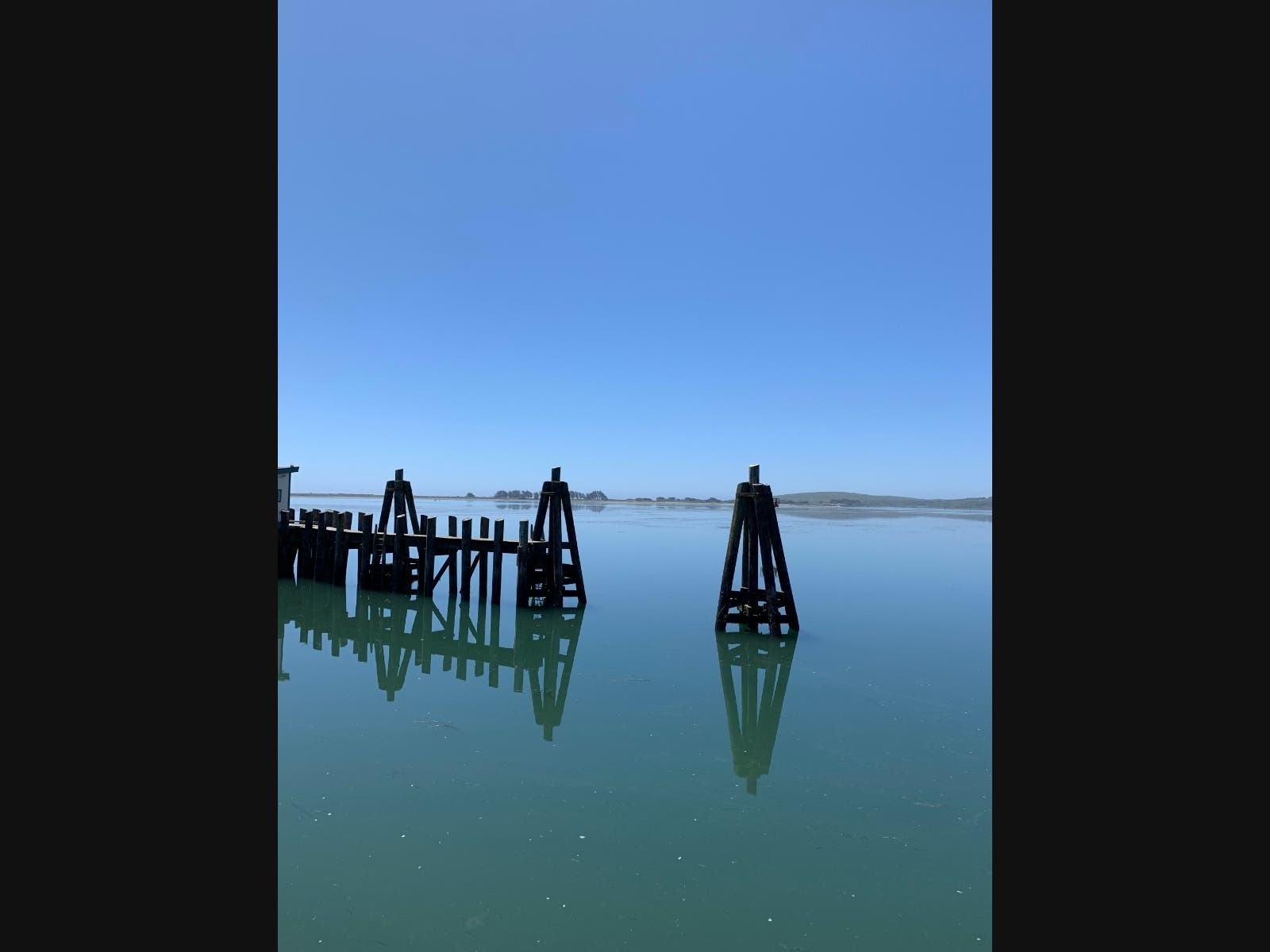Blue sea meets blue sky in this tranquil photo taken at Bodega Bay along the Sonoma County coast.