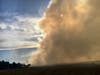 Smoke billows from a brush fire Friday around 5 p.m. in Fairfield, California, near I-680.