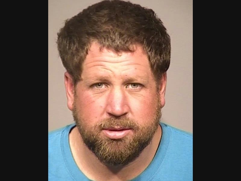 Mitchell James Deck is shown in a sheriff's jail booking photo