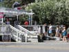 Amid 106-degree heat Saturday in Healdsburg, customers wait in for cold treats at Wicked Slush near the Russian River.
