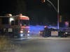 Fire evacuees leave Angwin, a community in Napa County, on Wednesday night.