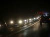 Fire evacuees leave Angwin, a community in Napa County, on Wednesday night.