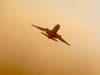 An air tanker emerges from the smoke after making a drop on the Walbridge Fire in Sonoma County, Aug. 21, 2020.