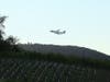 An air tanker flies over the Walbridge Fire west of Healdsburg in Sonoma County.