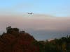 An air tanker flies over the Walbridge Fire west of Healdsburg in Sonoma County.