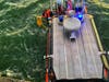 A man whose boat capsized Wednesday in the waters off Rodeo is pulled aboard a U.S. Coast Guard craft.