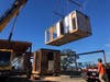 A prefabricated home by Plant Prefab is installed this week in the Petaluma Gap area, replacing a home lost in the 2017 wildfires.