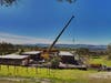 A prefabricated home by Plant Prefab is installed this week in the Petaluma Gap area, replacing a home lost in the 2017 wildfires.
