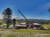 A prefabricated home by Plant Prefab is installed this week in the Petaluma Gap area, replacing a home lost in the 2017 wildfires.