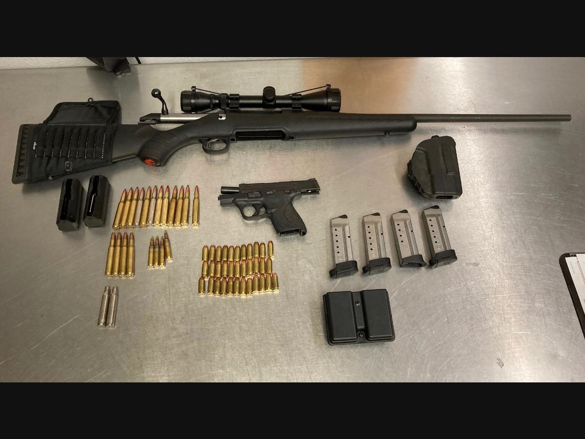 Police said the loaded handgun and rifle pictured above were seized in a search of a DUI suspect's car Tuesday night in Petaluma.