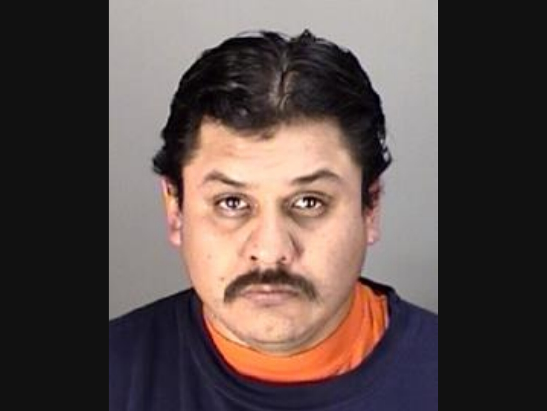 Flemin Fernando Martinez is shown in an October 2019 jail booking photo.