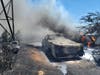 A vehicle and residential structure burn in a fire Wednesday afternoon on Cambark Court in Martinez.