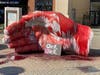 Animal blood was smeared on a large statue of a hand in front of Santa Rosa Plaza mall early Saturday, April 17. Police said vandals also left a handmade sign of a pig with the words "Oink Oink."