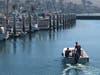 A marina crew is pictured Thursday morning in Bodega Bay, where clear skies and cool weather greeted those wishing to escape the inland heat headed but not without lots of traffic.