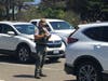 A park ranger with Sonoma County Regional Parks issues a parking ticket Thursday at Doran Regional Park on the Sonoma Coast, where folks flocked to escape the heat wave.
