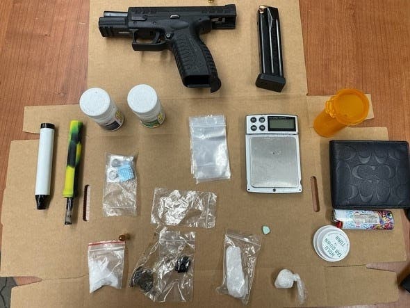 Methamphetamine, cocaine, heroin, cash and a loaded gun were seized in a search of Hazem Awad's car.