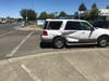 An SUV is shown after a collision Tuesday with a motorcycle at Santa Rosa Avenue and Elsa Drive.