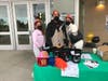 Students from American Canyon High School's Leadership Class partner with the Fire Department to host a welcome table on Napa County Walk & Roll To School Day, Oct. 6, 2021.