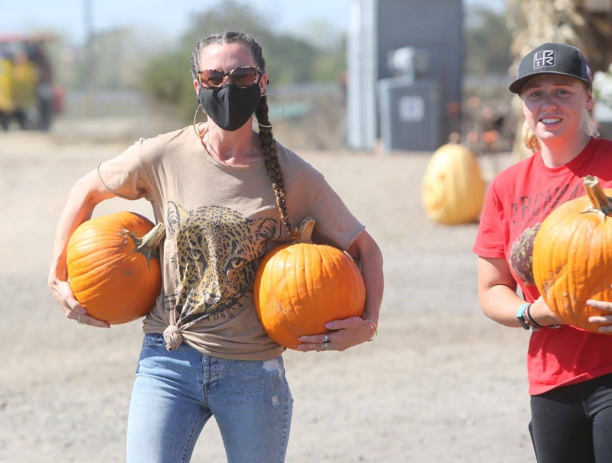 Finding the perfect pumpkin brings smiles at Pronzini Pumpkin Patch in Petaluma.