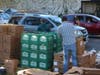 Volunteers hand out Thanksgiving meals complete with turkeys Sunday at the Napa Expo.