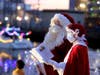 Santa and Mrs. Claus make an early stop Saturday for the Holiday Lighted Boat Parade in Petaluma.