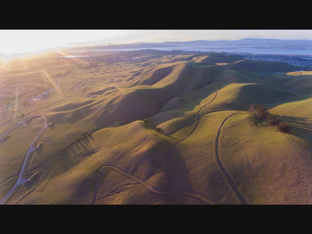The hills and ridgeline pictured here between the cities of Pittsburg and Concord are protected for now from a 1,650-unit housing development.