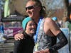 Mason Frank (right) celebrates finishing first in the men's overall race at the 43rd annual Napa Valley Marathon, held March 6, 2022.