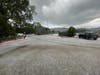 Hail covers the ground Tuesday afternoon in St. Helena.