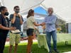 Andy Berliner (right), CEO and founder of Amy's Kitchen, hands out the 2022 scholarships at a ceremony held Aug. 9 in Santa Rosa. 
