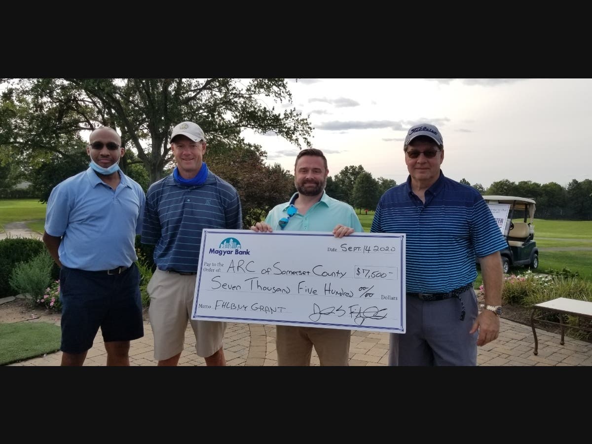Tom Logan, Magyar Bank  John Reissner, Magyar Bank  Michael Stefani, President of The Arc of Somerset County Board and Dan Badea, Magyar Bank