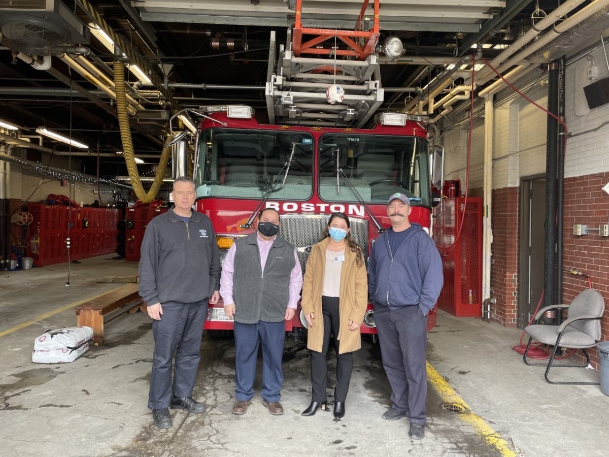 Pictured left to right: firefighter Michael Gormley; Edelweiss Village Executive Director Renato Leon; Edelweiss Village Director of Community Relations Jill Hemeon; firefighter Brian Lynch  