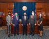 Leaders of The Church of Jesus Christ of Latter-day Saints in Atlanta meet with Governor Kemp to present him with his family history, a pedigree chart and other historical documents. In the photo, Jermaine Sullivan, Renè R. Alba, Governor Brian Kemp, M