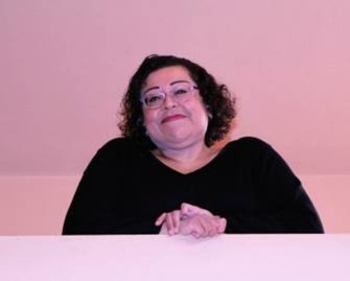  Diana Lopez is one of about 100 librarians nationwide who earned Advocate status from Library Journal.