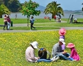 A family enjoys a picnic at McNears Beach Park.